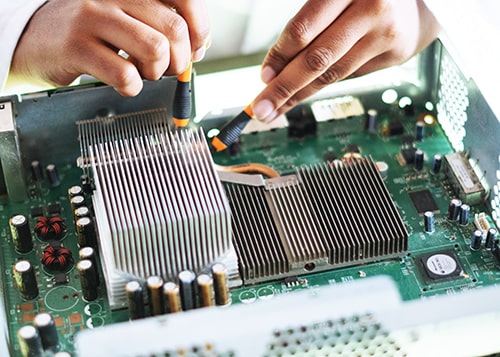 Technician repairing circuit board